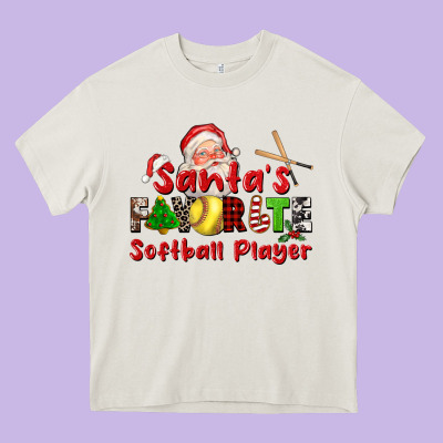 Santas Favorite Softball Player Heavy Core Tee Designed By Cowgirlartshop