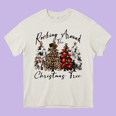 Rocking Around The Christmas Tree Heavy Core Tee Designed By Cowgirlartshop