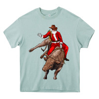 Arona santa riding a bull Heavy Core Tee - CowGirlArtShop