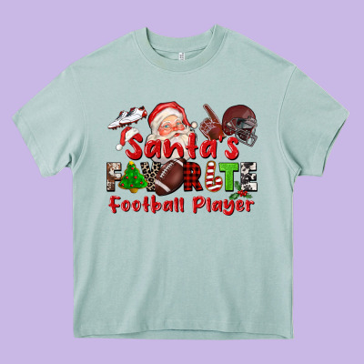 Santas Favorite  Football Player Heavy Core Tee Designed By Cowgirlartshop