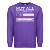 Purple nurses not all superheroes wear caps some wear scrubs nurse supportive Premium Sweatshirt - linhVisuals