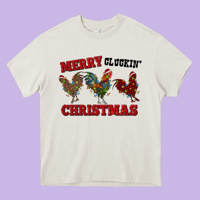 Merry Cluckin' Christmas Heavy Core Tee Designed By Ranaportraitstore