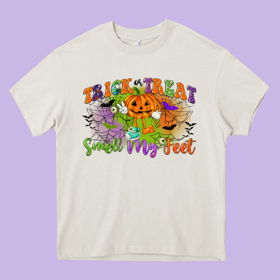 Trick Or Treat Smell My Feet Heavy Core Tee Designed By Cowgirlartshop