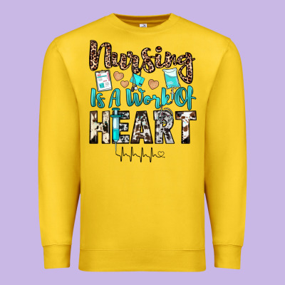 Nursing Is A Work Of Heart Premium Sweatshirt Designed By Jahusdesignshop