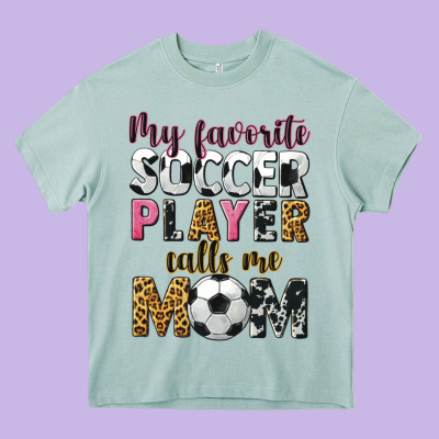 My Favorite Soccer Player Calls Me Mom Heavy Core Tee Designed By Cowgirlartshop