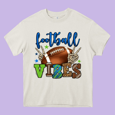 Football Vibes Green And Blue Heavy Core Tee Designed By Howdyjamesfarm