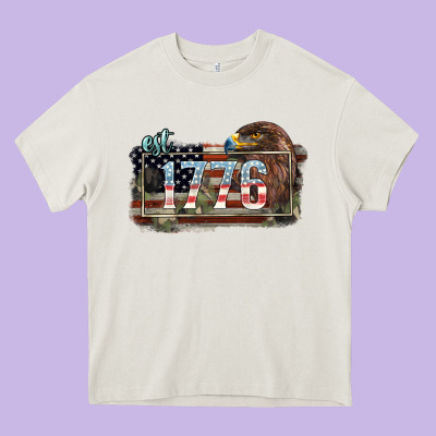 Eat. 1776 Eagle 4th Of July Heavy Core Tee Designed By Howdyjamesfarm