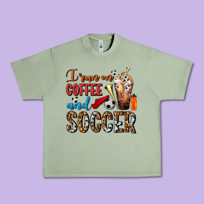I Run On Coffee And Soccer Frappe Urban Heavy Tee Designed By Fadigitalartstudio
