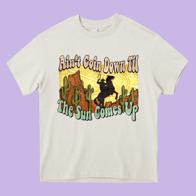 Ain't Goin Down Til The Sun Comes Up Cowboy Heavy Core Tee Designed By Howdyjamesfarm
