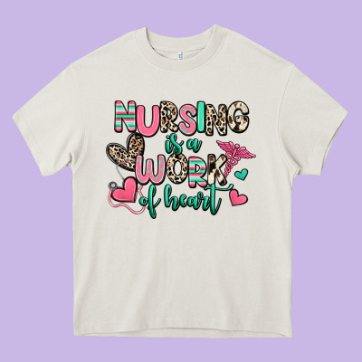 Nursing Is A Work Of Heart Heavy Core Tee Designed By Ranaportraitstore