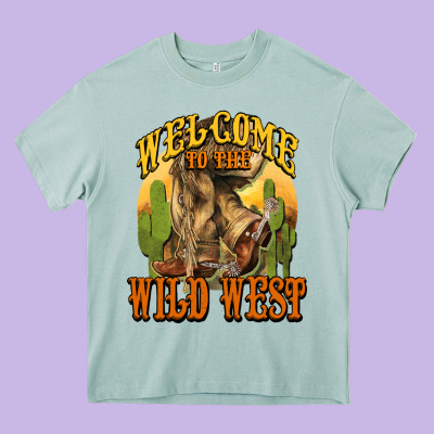 Welcome To The Wild West Cowboy Boots Heavy Core Tee Designed By Howdyjamesfarm