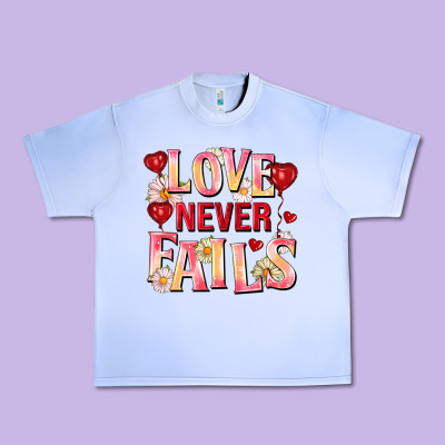 Love Never Fails Urban Heavy Tee Designed By Fadigitalartstudio