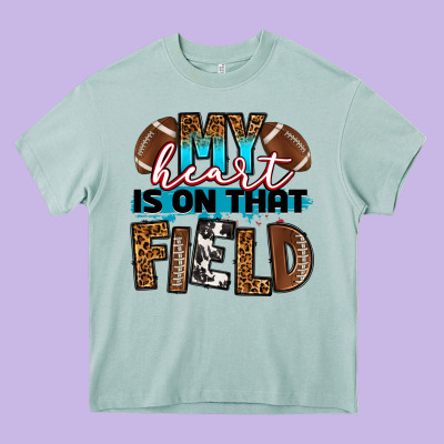 My Heart Is On That Field Football Heavy Core Tee Designed By Ranaportraitstore
