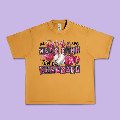 In October We Wear Pink And Watch Baseball Urban Heavy Tee Designed By Fadigitalartstudio