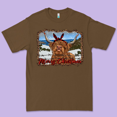 Merry Christmas Highland Cow With Farm Premium Tee Designed By Ranaportraitstore