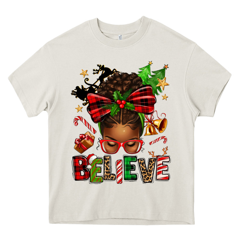 Christmas Believe Afro Messy Bun Heavy Core Tee by texasbilliewilder | Teevron