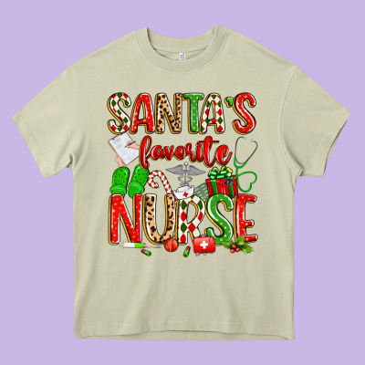 Santa's Favorite Nurse Heavy Core Tee Designed By Texasbilliewilder