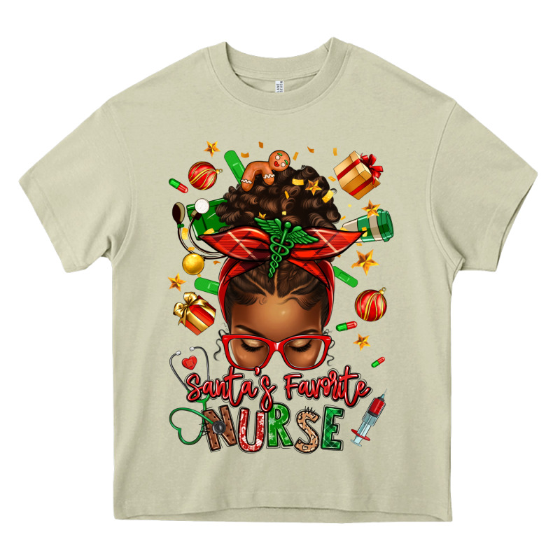 Santa's Favorite Nurse Afro Messy Bun Heavy Core Tee by texasbilliewilder | Teevron