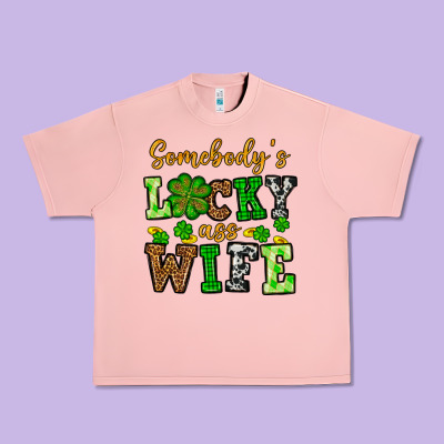 St. Patrick's Somebody’s Lucky Ass Wife Urban Heavy Tee Designed By Oliviacreatesart