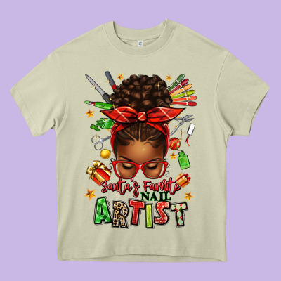 Santa's Favorite Nail Artist Afro Messy Bun Heavy Core Tee Designed By Texasbilliewilder
