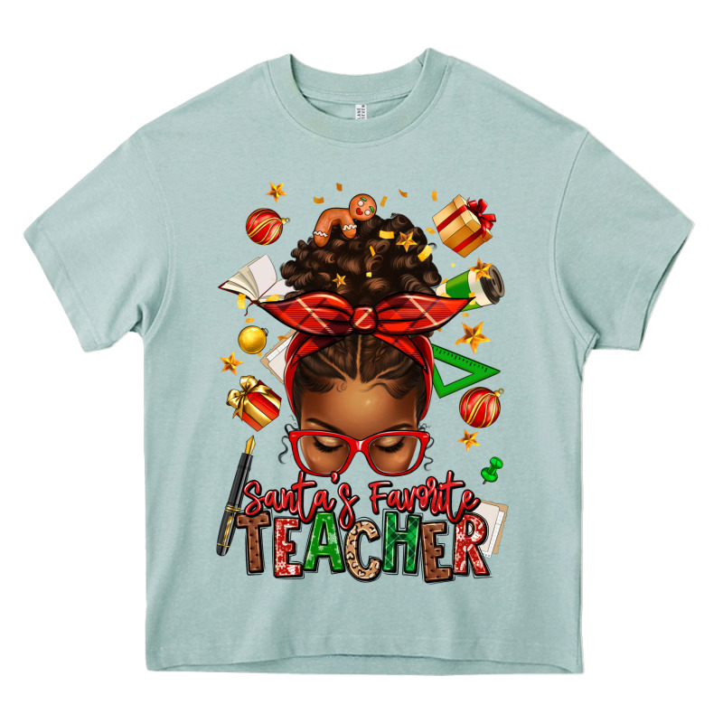 Santa's Favorite Teacher Afro Messy Bun Heavy Core Tee by texasbilliewilder | Teevron