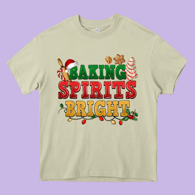 Baking Spirits Bright Heavy Core Tee Designed By Nancycooperartshop