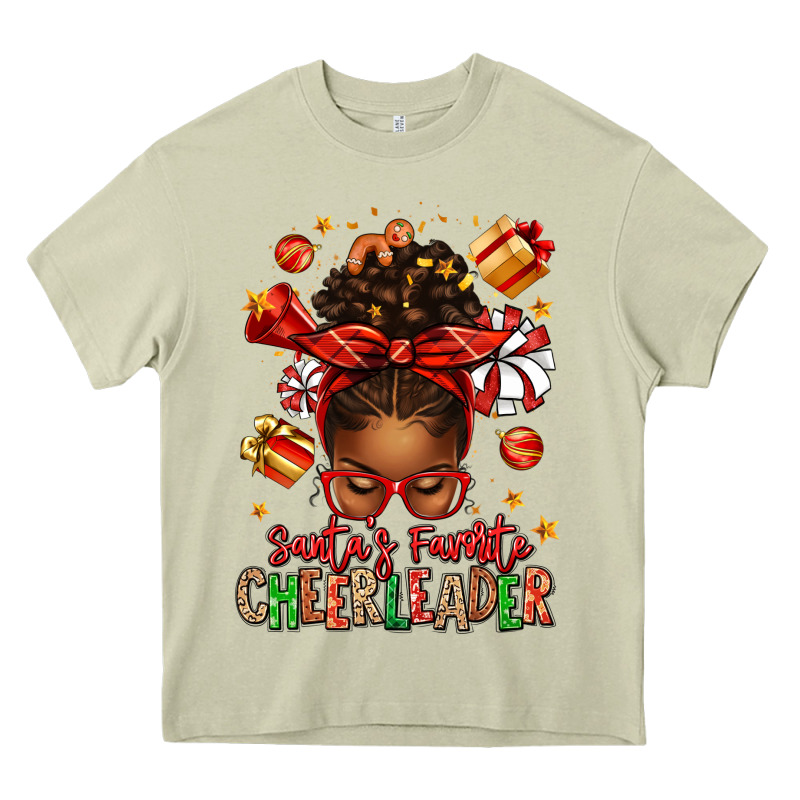 Santa's Favorite Cheerleader Afro Messy Bun Heavy Core Tee by texasbilliewilder | Teevron