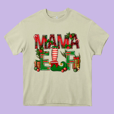 Christmas Mama Elf Heavy Core Tee Designed By Nancycooperartshop