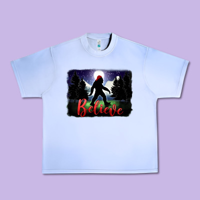 Bigfoot Believe Christmas Urban Heavy Tee Designed By Fadigitalartstudio