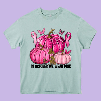 In October We Wear Pink With Pumpkin Heavy Core Tee Designed By Texasbilliewilder