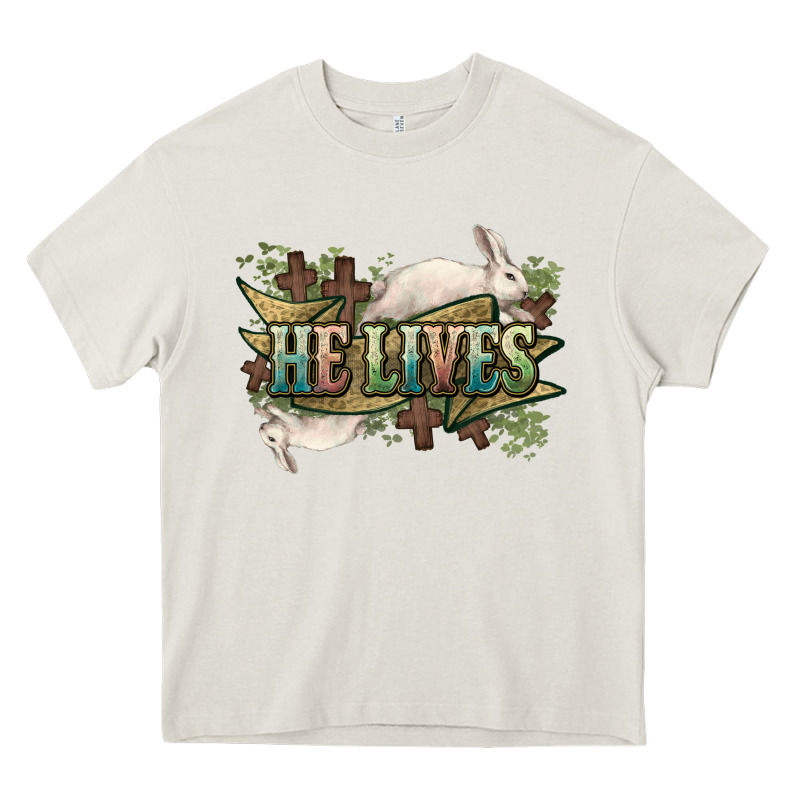 He Lives Easter Heavy Core Tee by NancyCooperArtShop | Teevron