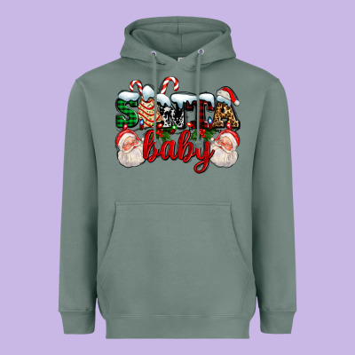 Santa Baby With Santa And Christmas Tree Cake Heavyweight Hoodie Designed By Adodesignshop