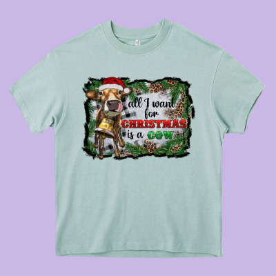All I Want For Christmas Is A Cow Heavy Core Tee Designed By Ranaportraitstore