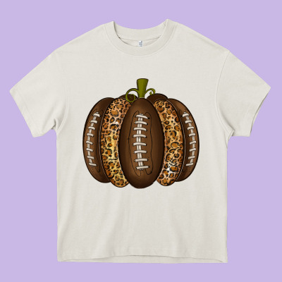 American Football Pumpkin Heavy Core Tee Designed By Texasbilliewilder