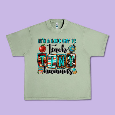 It's A Good Day To Teach Tiny Humans Urban Heavy Tee Designed By Oliviacreatesart