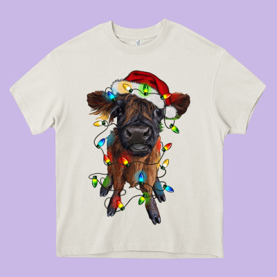 Highland Cow Calf With Christmas Lights Heavy Core Tee Designed By Ranaportraitstore