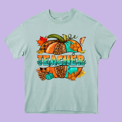 Teacher Pumpkin Heavy Core Tee Designed By Nancycooperartshop