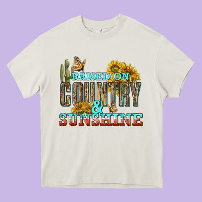 Raised On Country And Sunshine Heavy Core Tee Designed By Texasbilliewilder