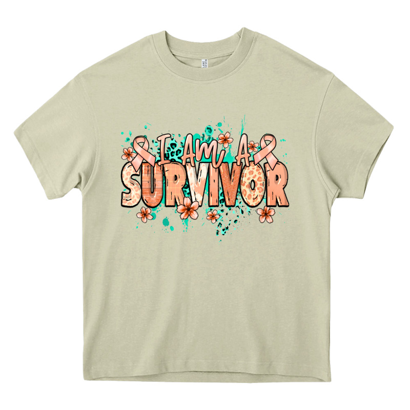 I Am A Survivor Peach Ribbon Heavy Core Tee by NancyCooperArtShop | Teevron