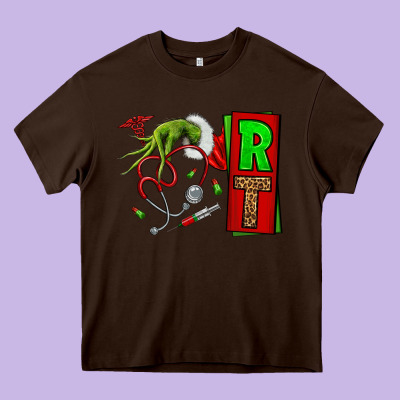 Christmas Character Nurse Heavy Core Tee Designed By Nancycooperartshop