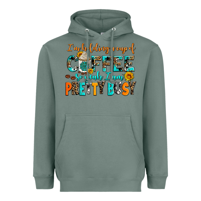 I Am Holding A Cup Of Coffee So Yeah Iam Pretty Bu Heavyweight Hoodie by AdoDesignShop | Teevron