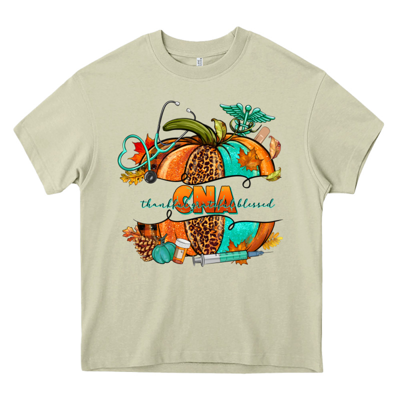 Cna Pumpkin Nurse Heavy Core Tee by NancyCooperArtShop | Teevron