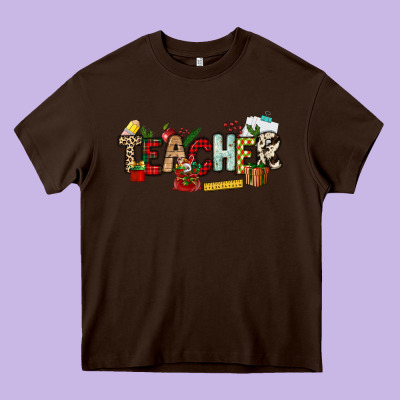 Christmas Teacher Heavy Core Tee Designed By Nancycooperartshop
