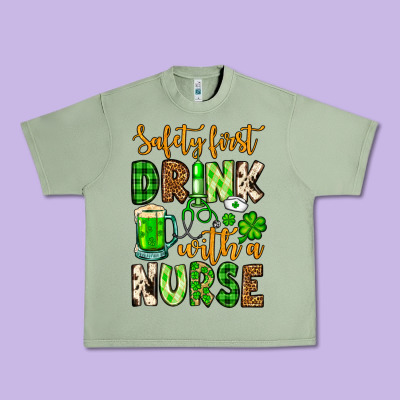 St. Patrick's Safety First Drink With A Nurse Urban Heavy Tee Designed By Oliviacreatesart