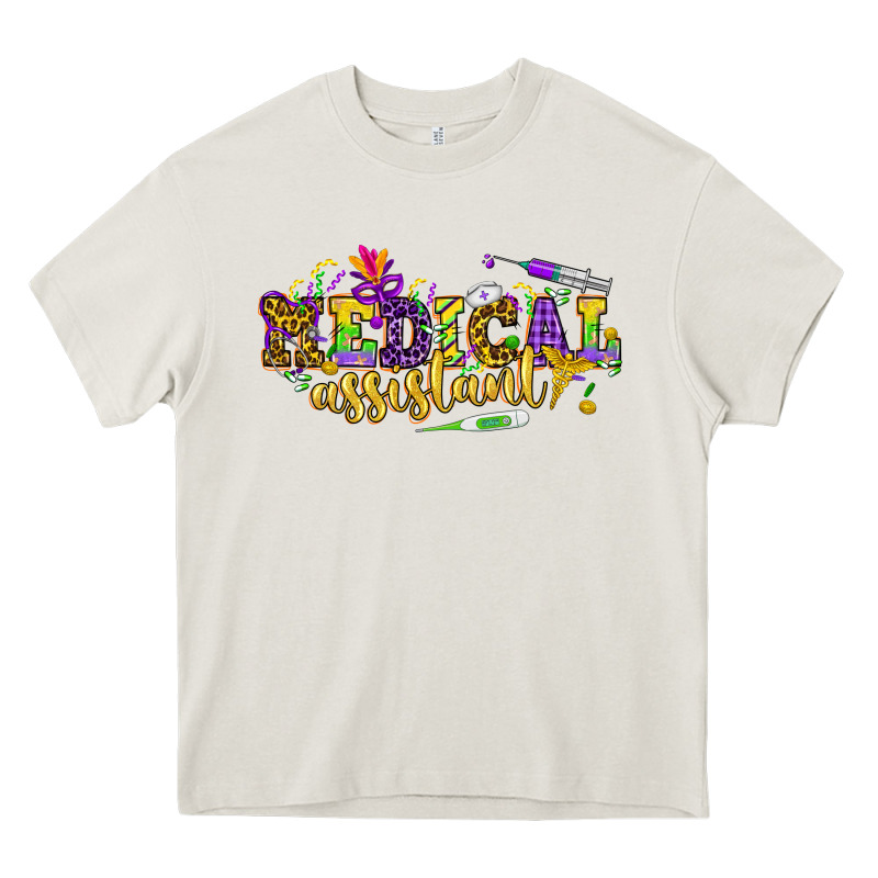 Ma Medical Assistant Mardi Gras Heavy Core Tee by NancyCooperArtShop | Teevron