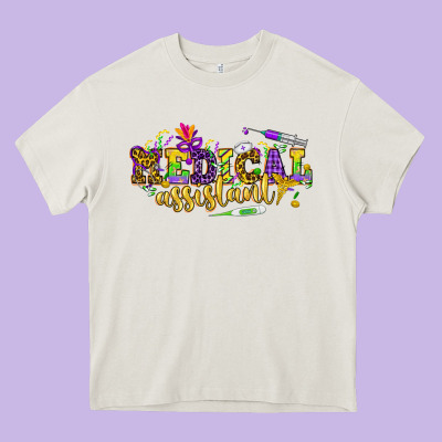 Ma Medical Assistant Mardi Gras Heavy Core Tee Designed By Nancycooperartshop