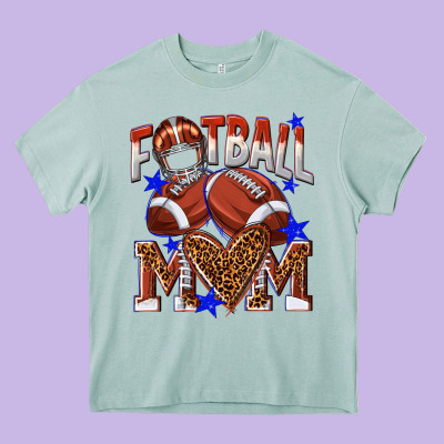 American Football Mom Heavy Core Tee Designed By Nancycooperartshop