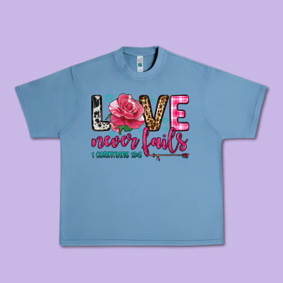 Love Never Fails Urban Heavy Tee Designed By Oliviacreatesart