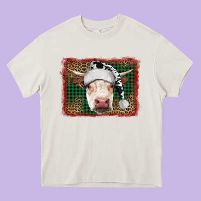 Merry Christmas Hereford Cow With Background Heavy Core Tee Designed By Ranaportraitstore