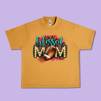Blessed American Football Mom Lightbulb Letters Urban Heavy Tee Designed By Oliviacreatesart
